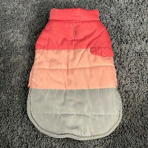 Lightly used size small shades of pink dog coat